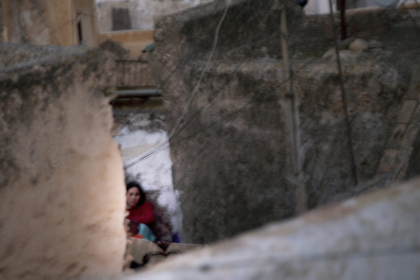 April Mountfort photographs – Hidden series: Young Woman on Roof #1