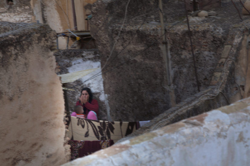 April Mountfort photographs – Hidden series: Young Woman on Roof #3