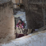 April Mountfort photographs – Hidden series: Young Woman on Roof #4