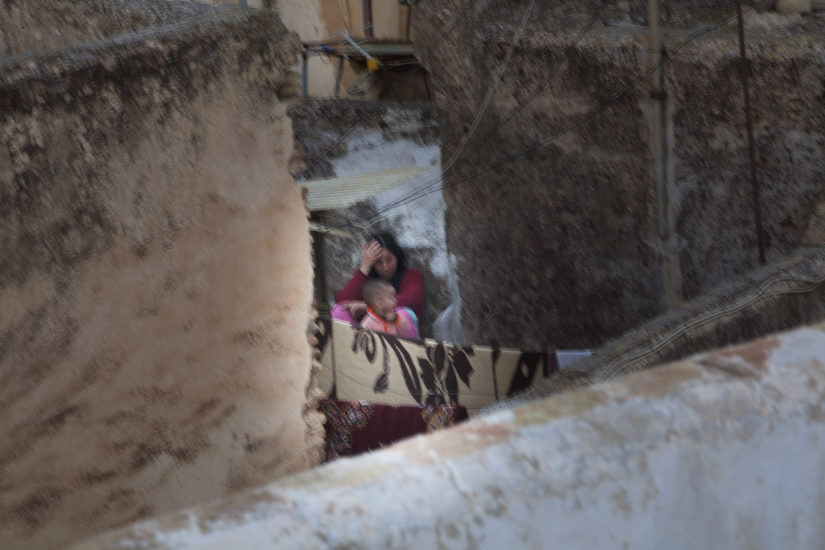 April Mountfort photographs – Hidden series: Young Woman on Roof #4