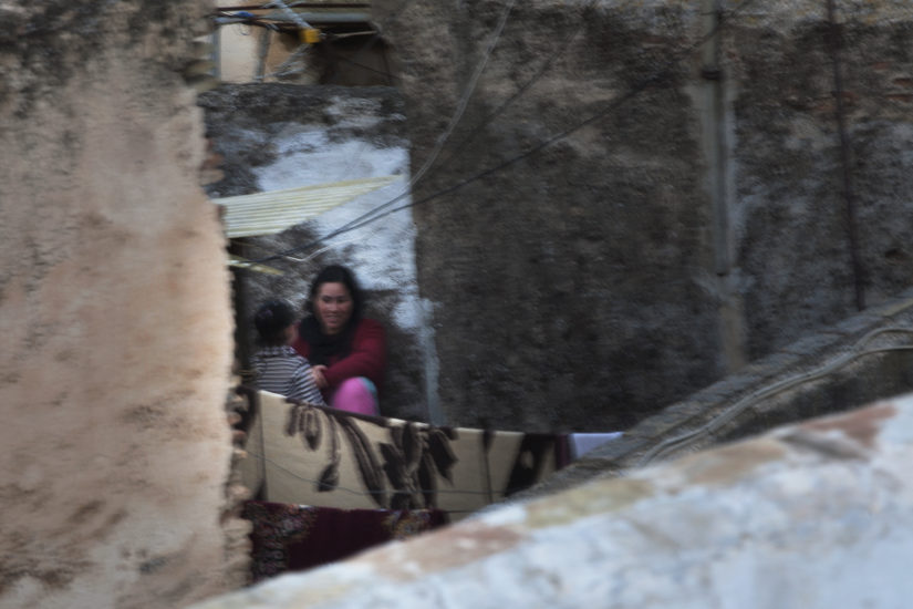 April Mountfort photographs – Hidden series: Young Woman on Roof #5