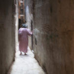April Mountfort photographs – Hidden series: Old Woman in Passage #2