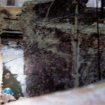 April Mountfort photographs – Hidden series: Young Woman on Roof #2