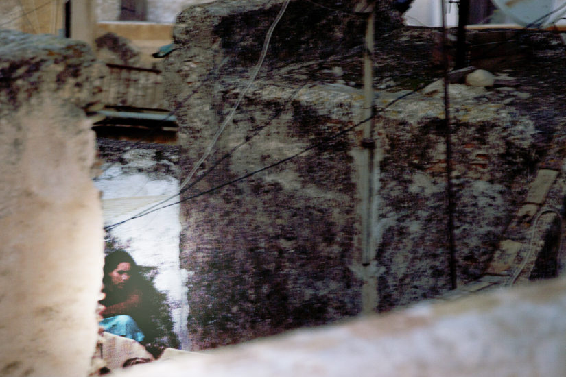 April Mountfort photographs – Hidden series: Young Woman on Roof #2